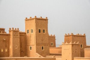 Business Growth in the Middle East – Historical buildings in Morocco with a grey background