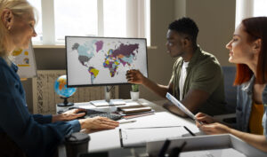 Economic Growth in the Arab World – side-view-woman-working-as-travel-agent